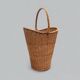 Old woven wicker umbrella stand