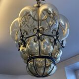 Blown glass and metal lantern