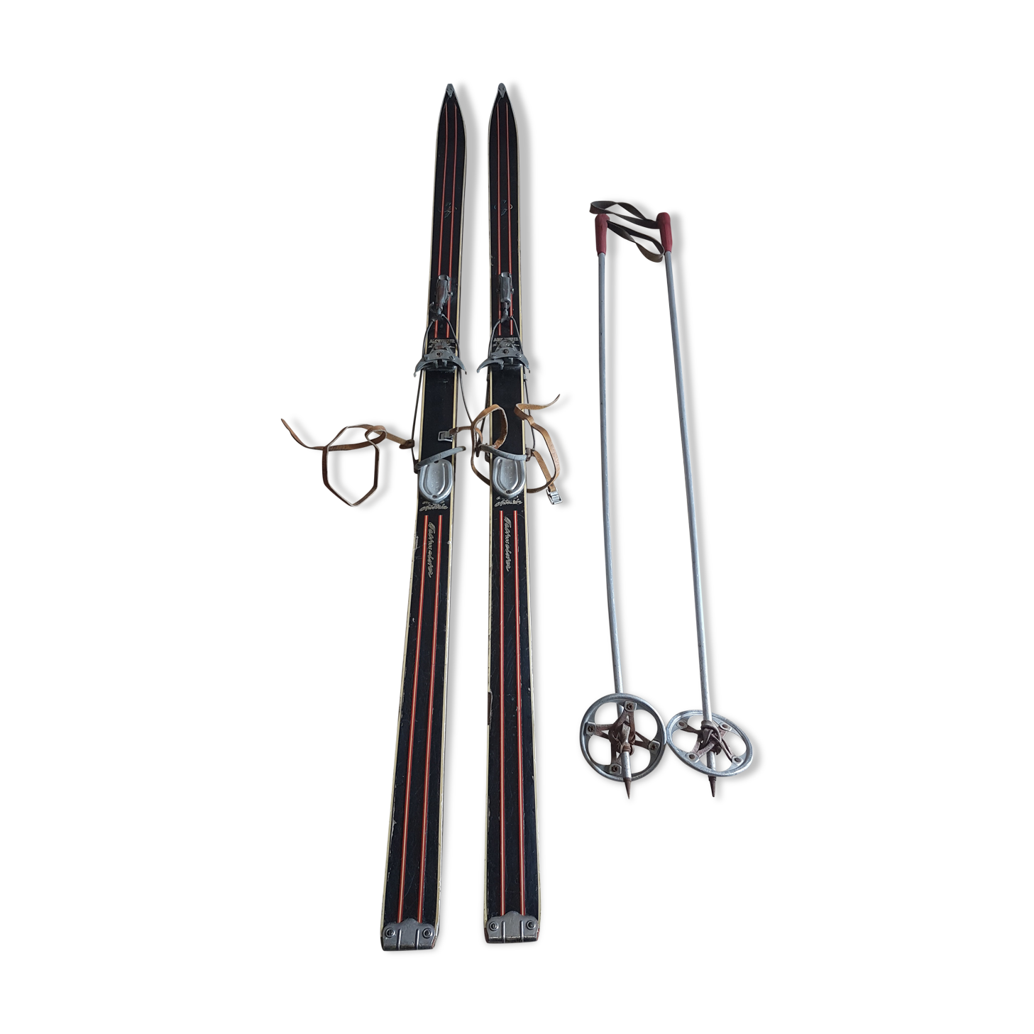 Old skis wooden and its pair of sticks