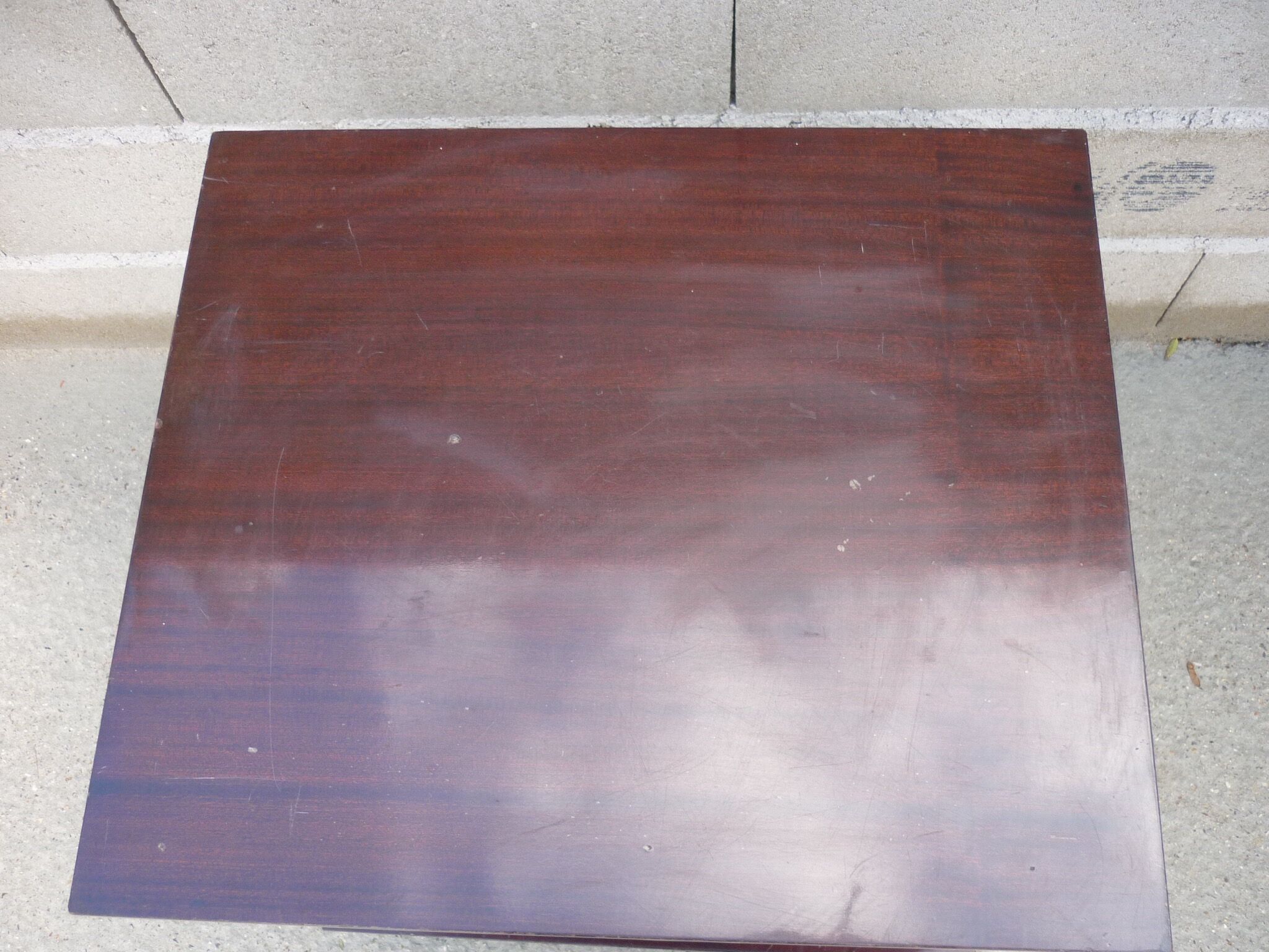 Wooden vintage table on wheels