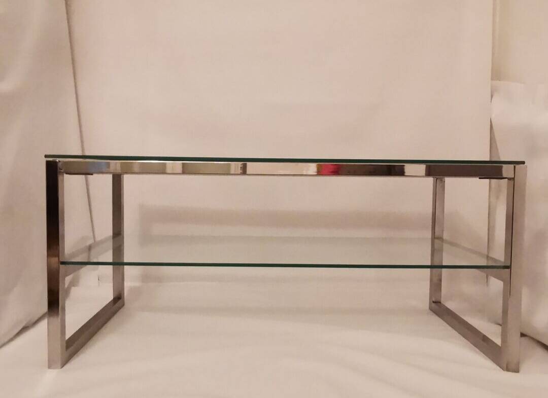 1980s coffee table with a double chrome metal top.