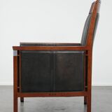 Black Art Deco cowhide leather and wooden design armchair with a high back