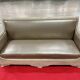 Antique banquette covered in faux shagreen.