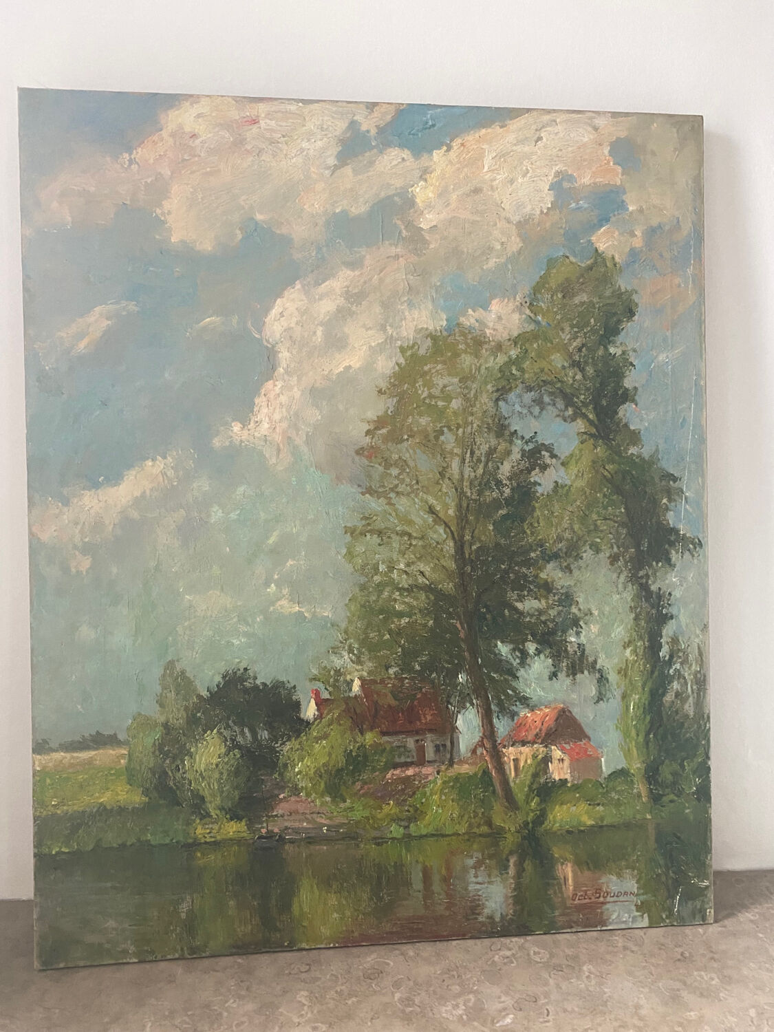 Paysage lacustre signé de 1943