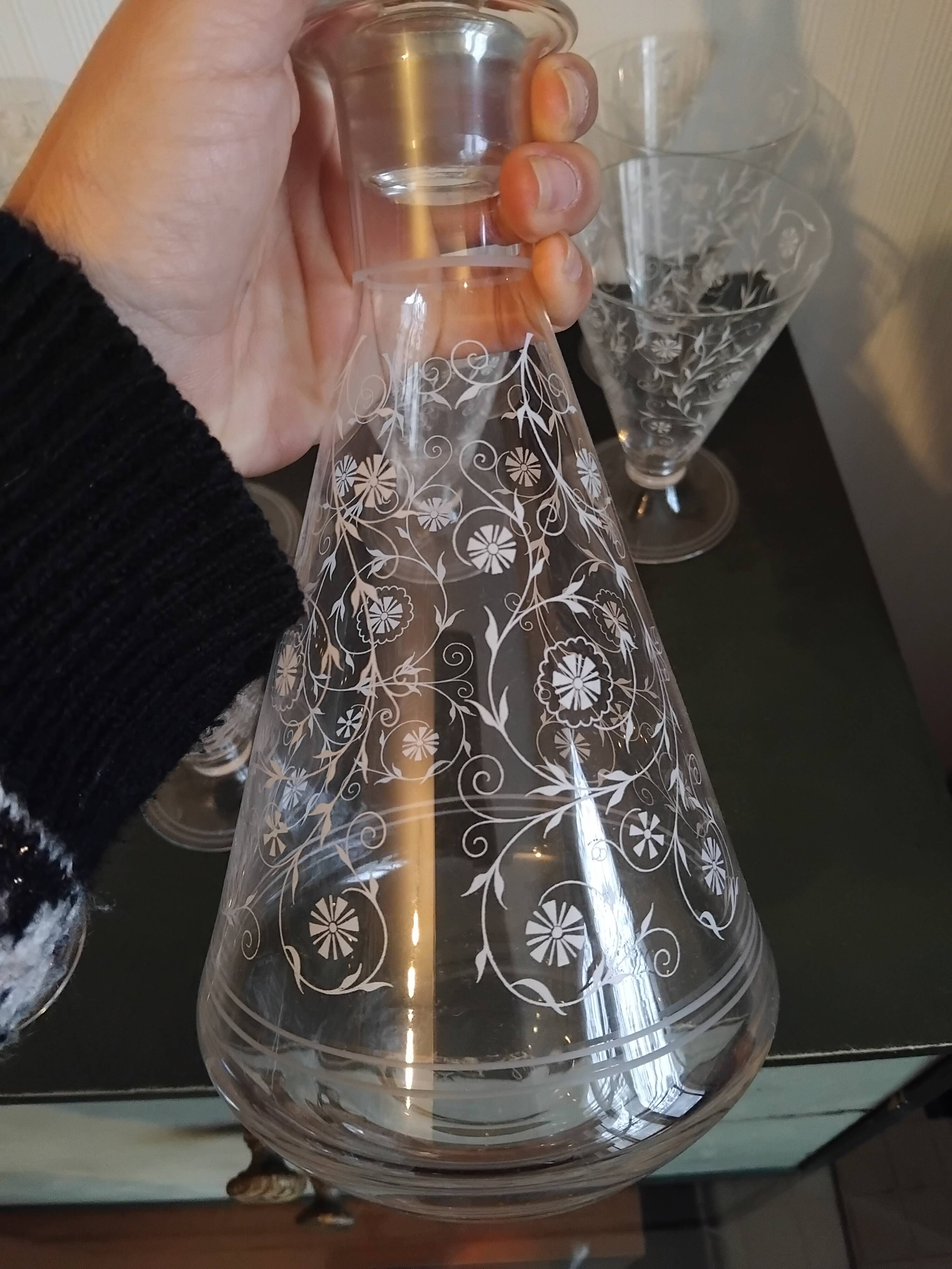 Set of 14 glasses and a carafe, 1960s.