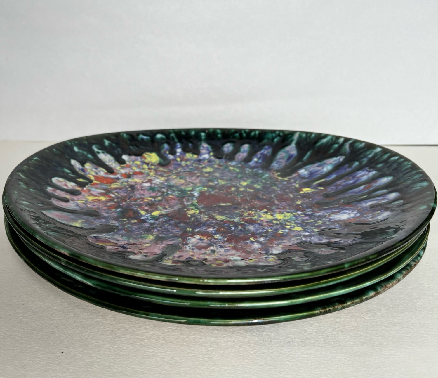 4 oval shaped plates Morvan