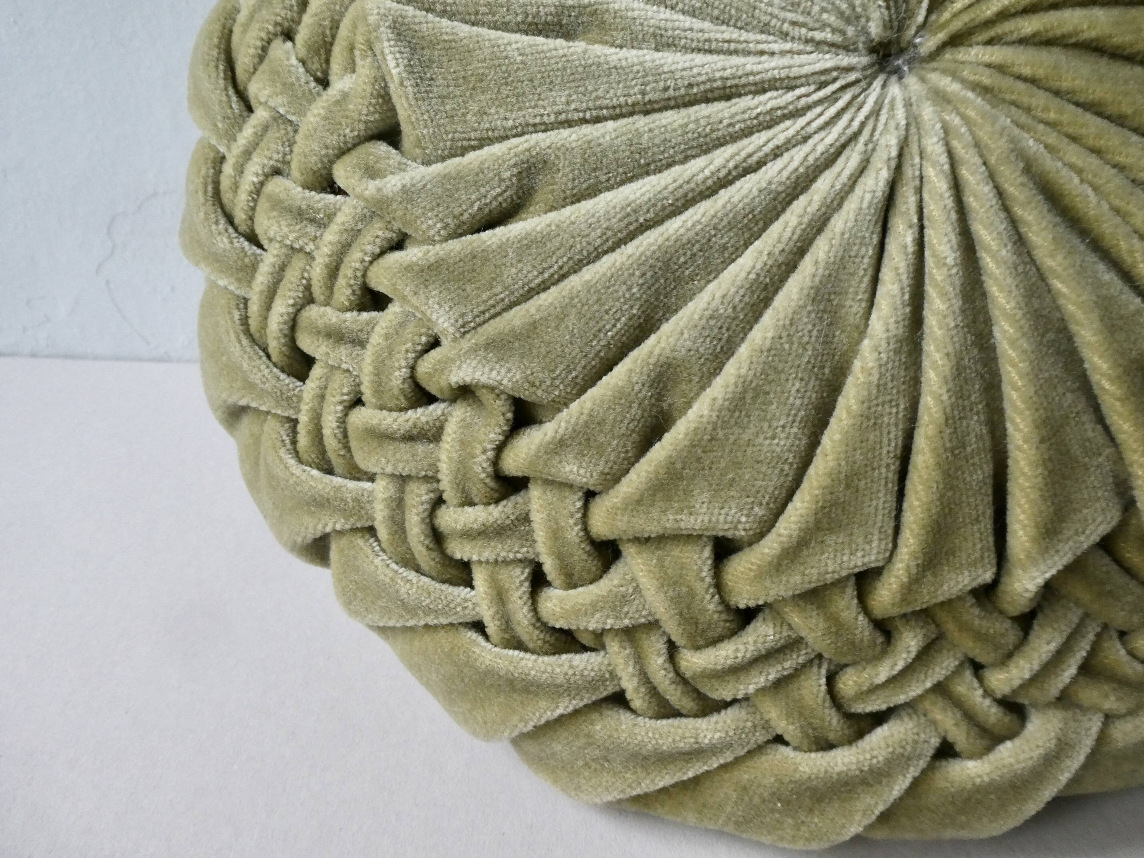 Pleated round cushion, almond green velvet