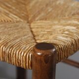 Vintage straw stool in the style of Charlotte Perriand, 1970s.