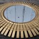 sun mirror in clothespins in gilded wood 32 x32 cm