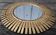 sun mirror in clothespins in gilded wood 32 x32 cm
