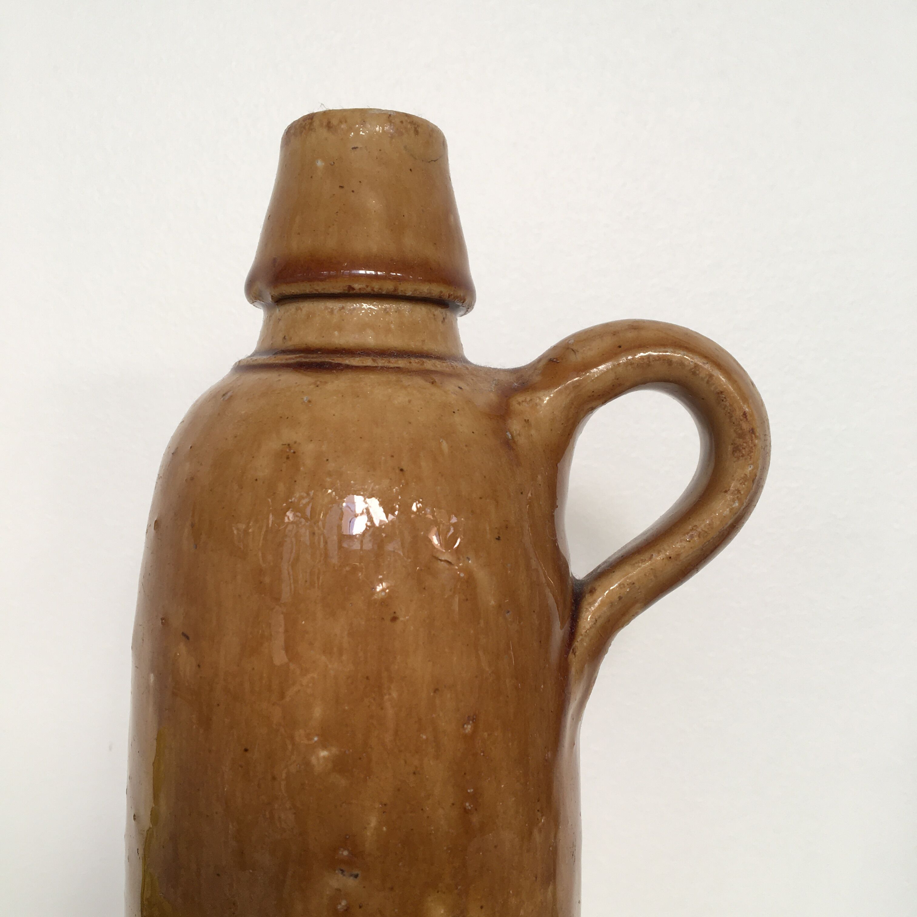 Bottle in glazed stoneware stamped labarre