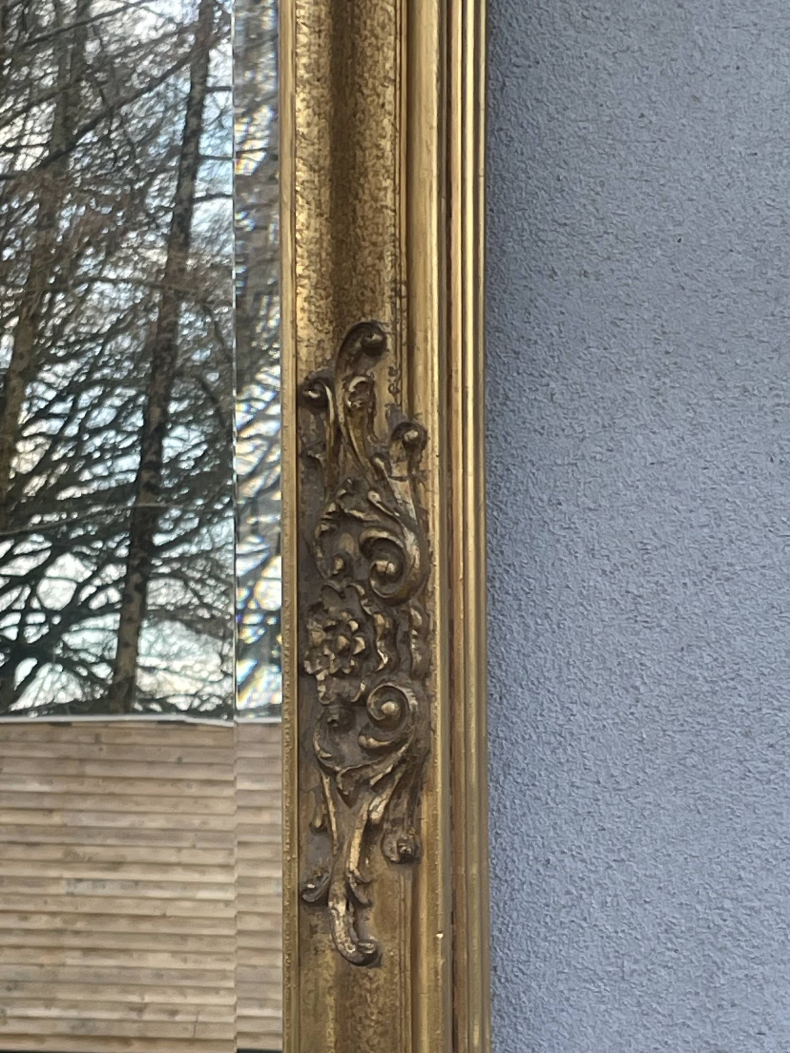 vintage bevelled mirror in rectangular shape, stucco and gilded wood in Louis XV baroque style