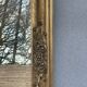 vintage bevelled mirror in rectangular shape, stucco and gilded wood in Louis XV baroque style