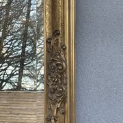 vintage bevelled mirror in rectangular shape, stucco and gilded wood in Louis XV baroque style