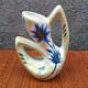 Earthenware vase signed by Jacqueline Gelb with a thistle decoration.