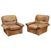 Paire de fauteuils lounge en cuir buffle cognac Arcon Italia