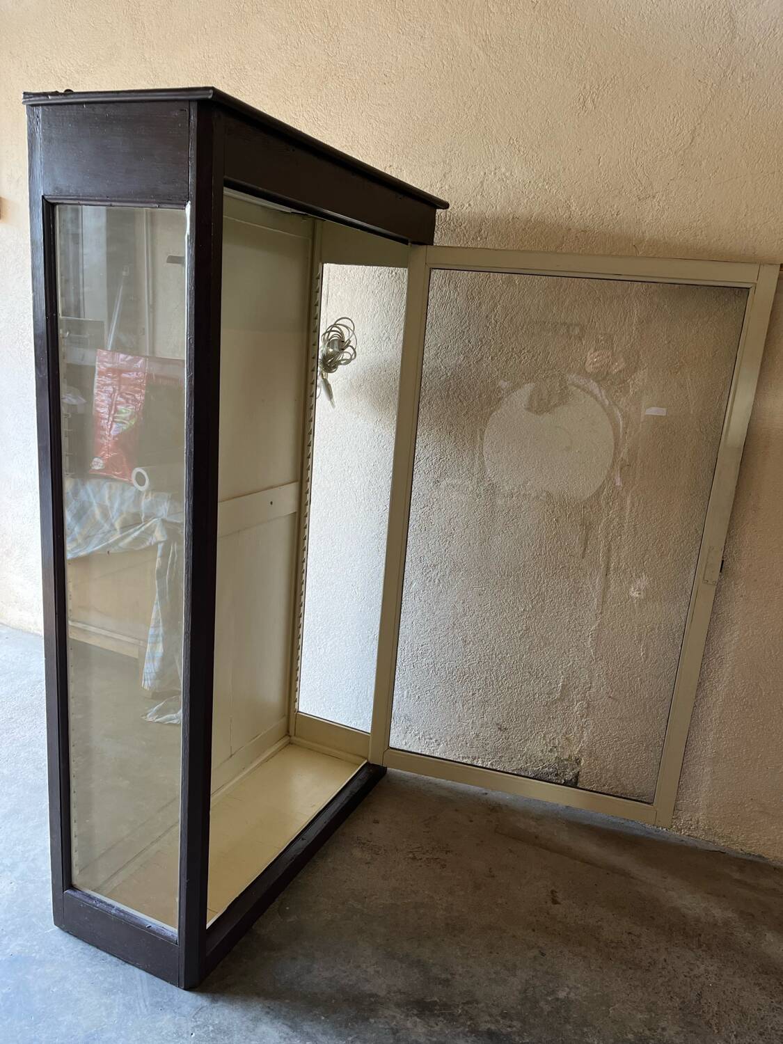 Old wooden glass display case