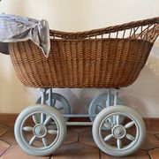 Antique rattan cradle in very good condition. Sold with or without upholstery.