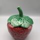 Condiment jar mustard jam in the shape of strawberry