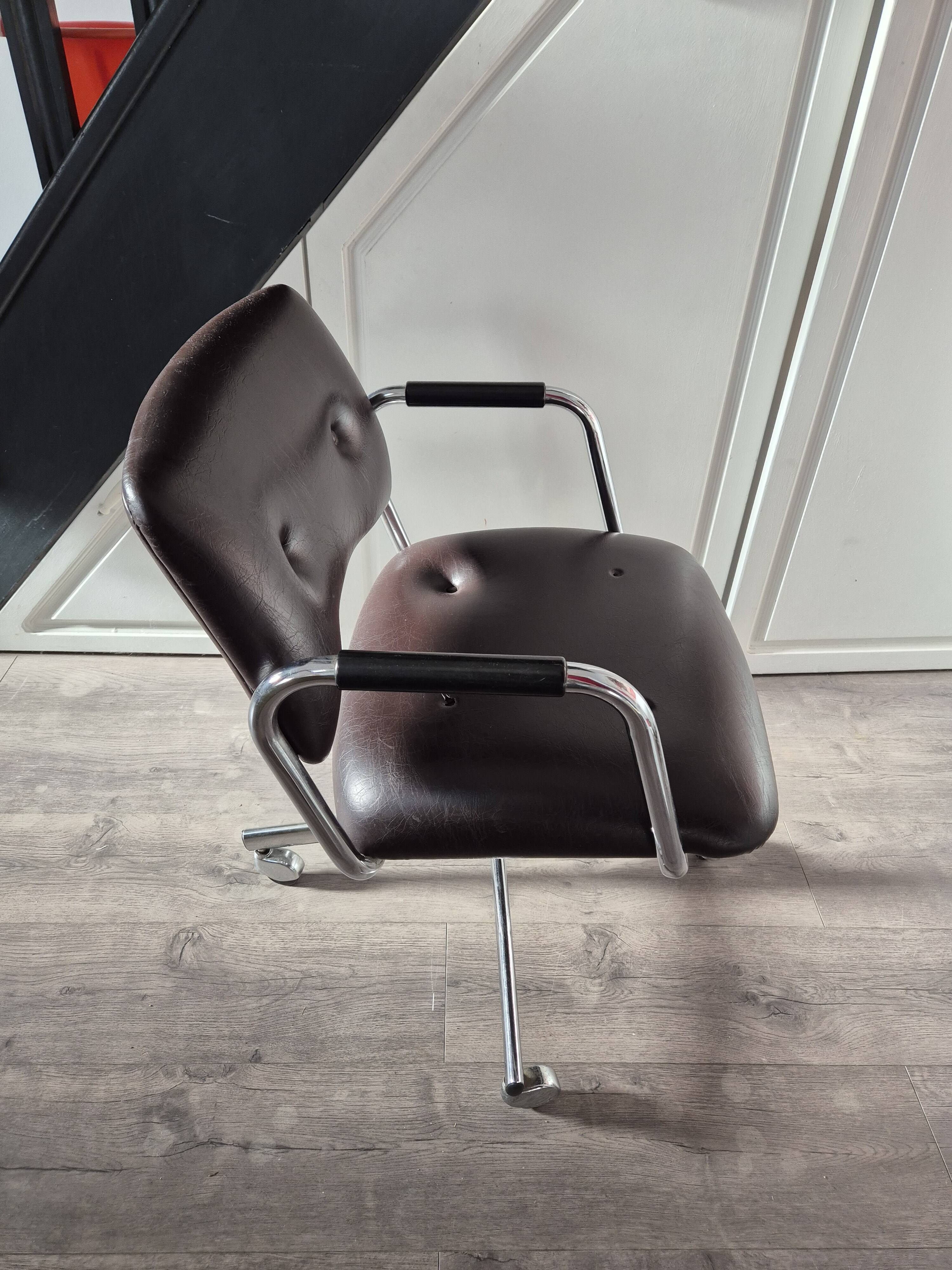 Vintage strafor brown leather armchair with casters
