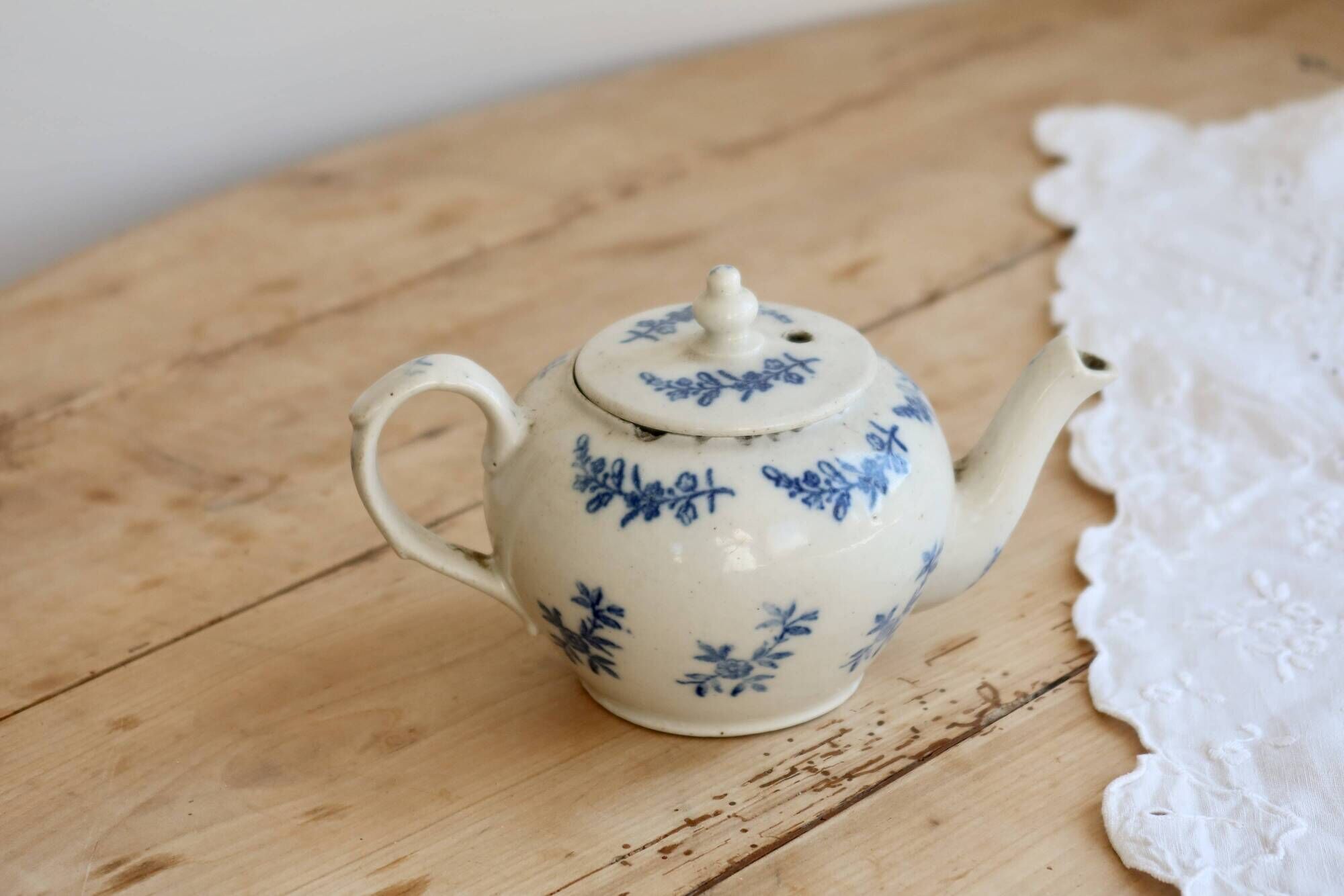 Antique teapot Saint-Uze steel clay with cobalt blue floral decoration.