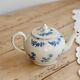 Antique teapot Saint-Uze steel clay with cobalt blue floral decoration.