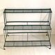 Green metal plant holder