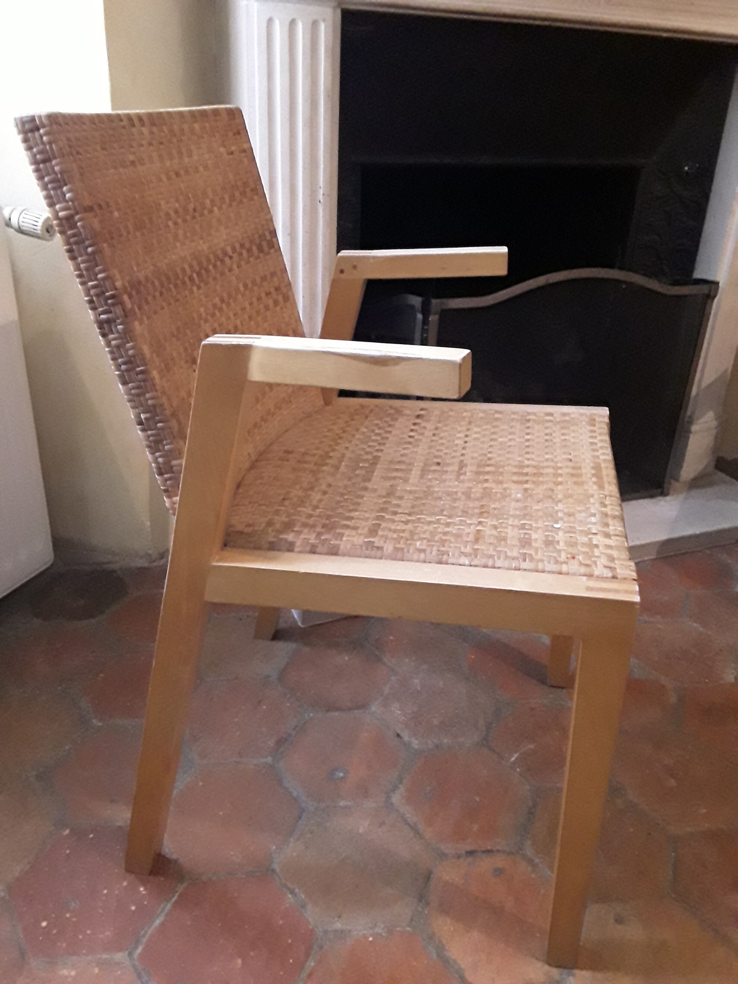 Two vintage braided straw armchairs