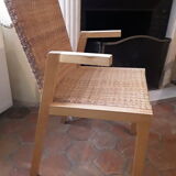 Two vintage braided straw armchairs