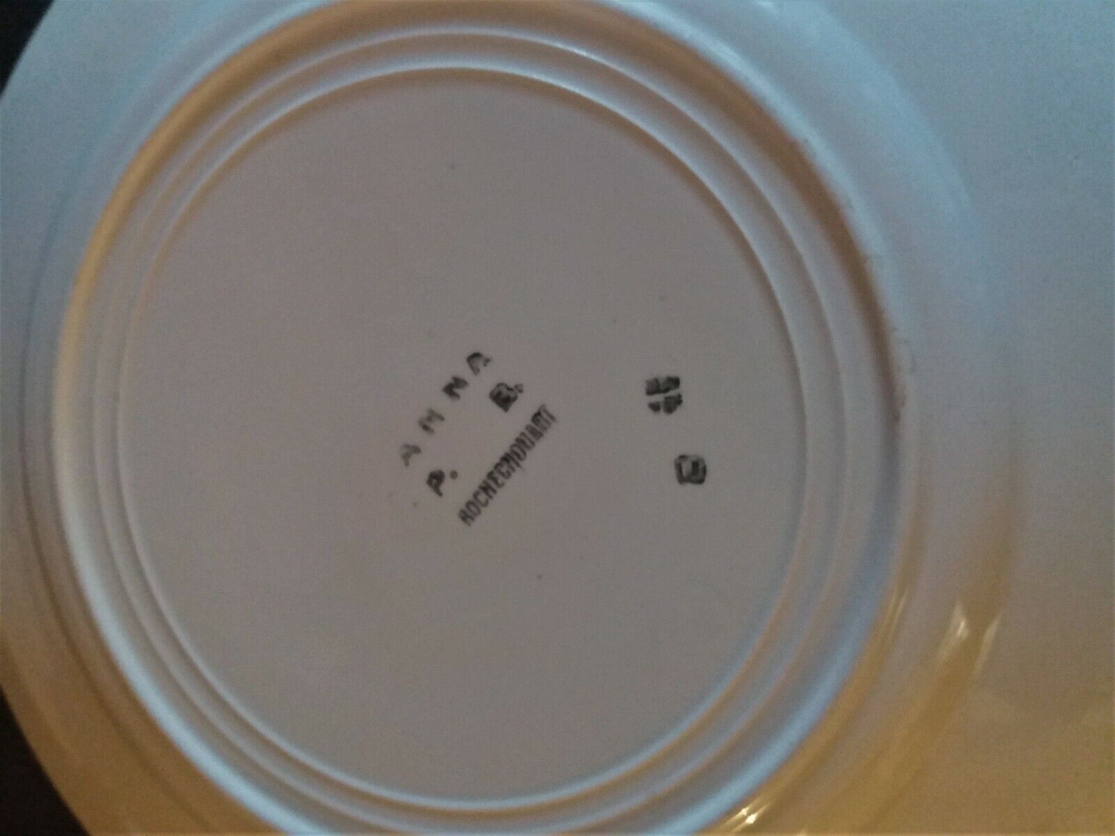 Series of four flat earthenware plates P.B. Rochechouart Limoges model Anna