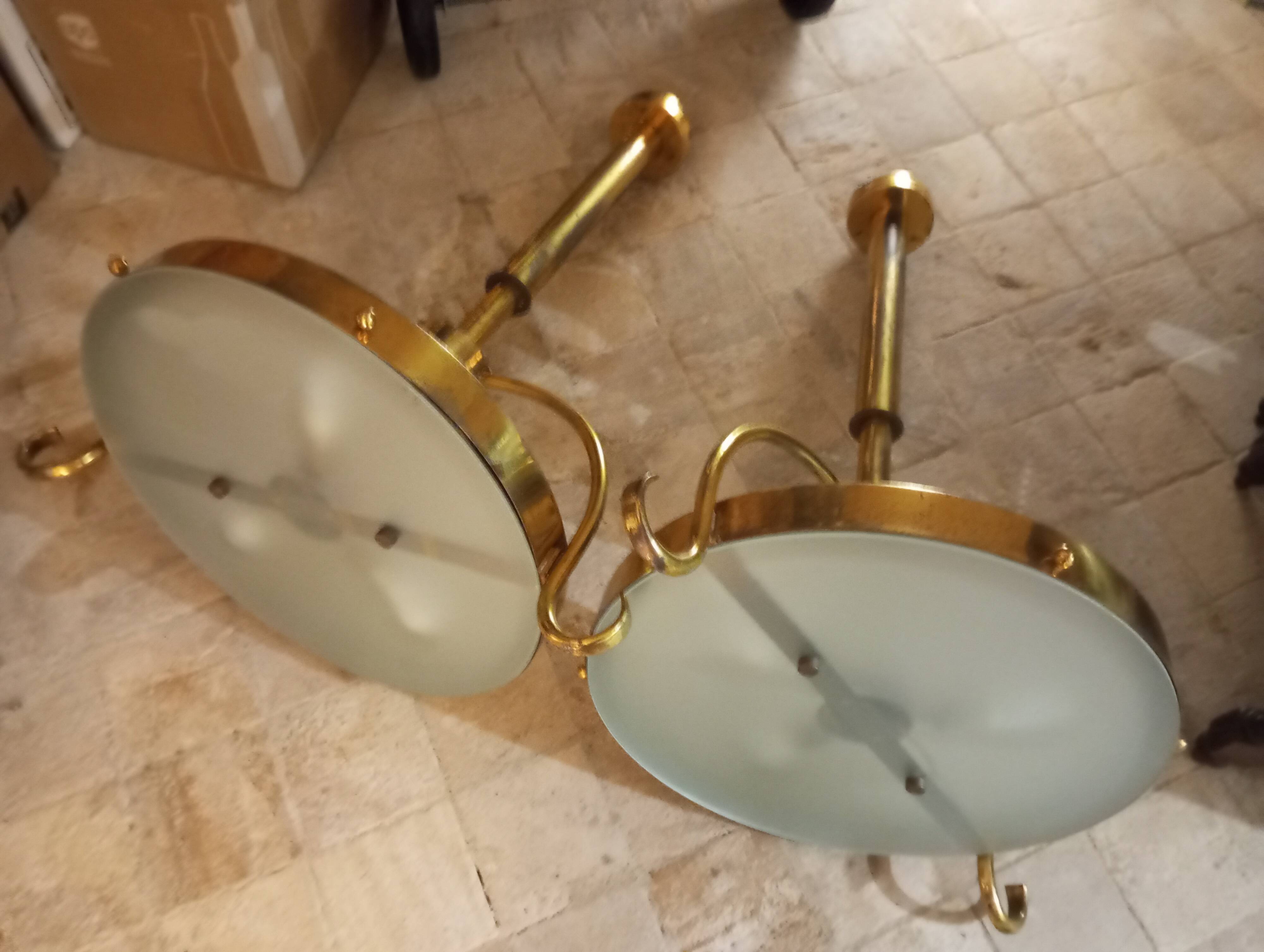 2 gold metal chandeliers