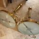 2 gold metal chandeliers