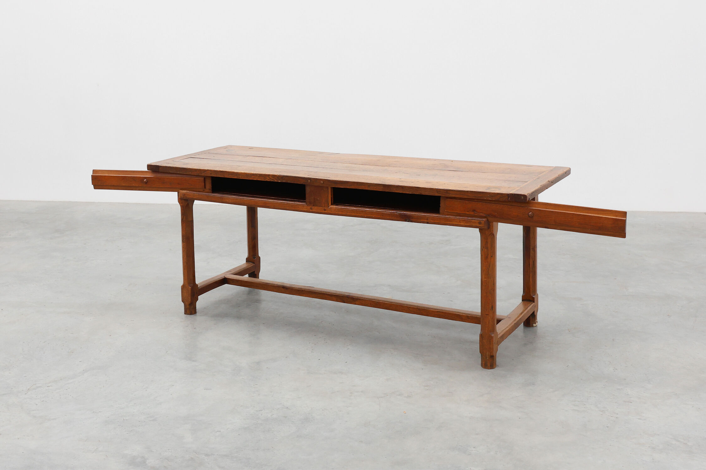 Rustic 19th century oak dinner table with drawers opening laterally, France
