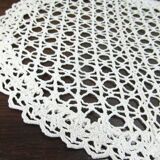 Handmade oval placemat in crocheted cotton lace