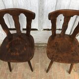 4 wooden chairs with brutalist design