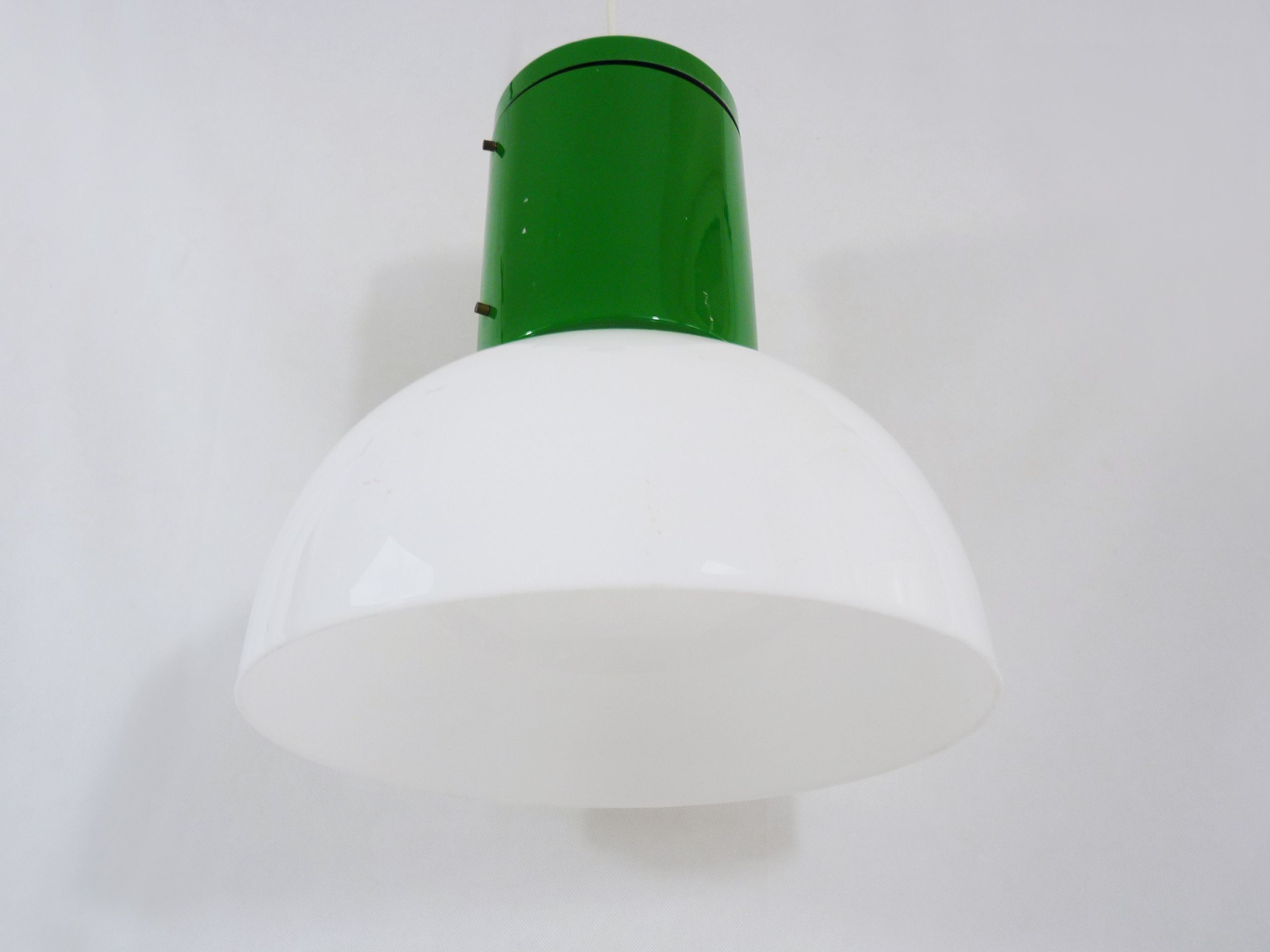 Vintage industrial suspension in green metal and white plastic lampshade. Year 70