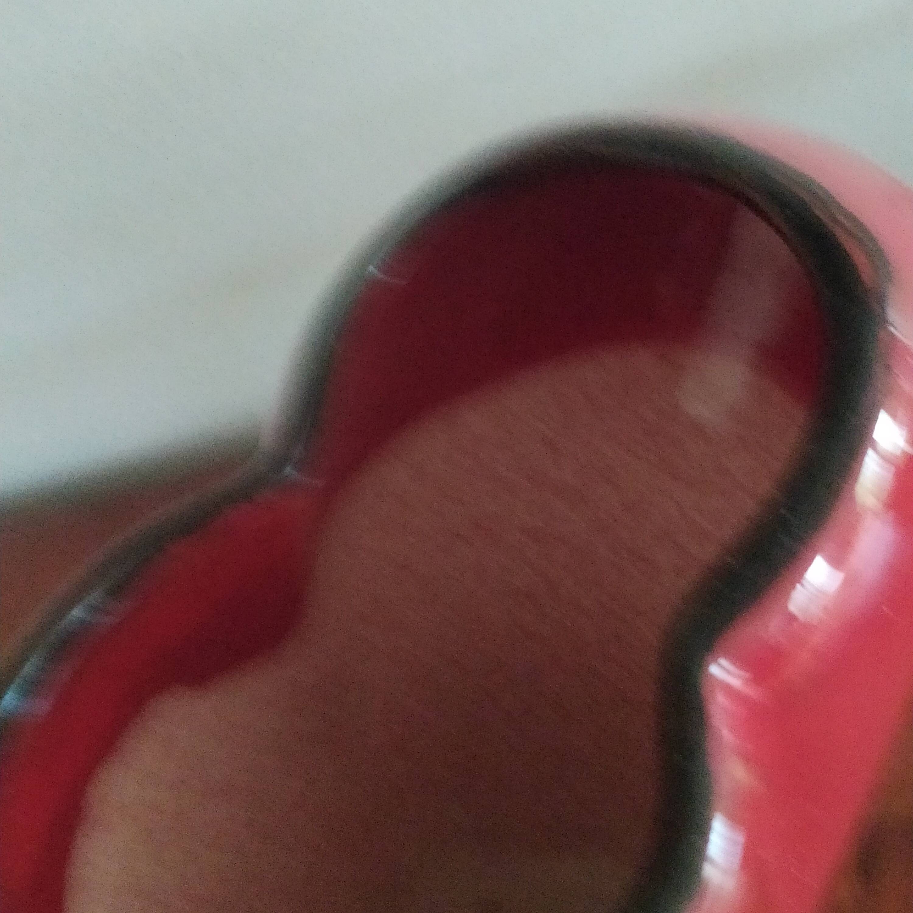 red ceramic designer vase by Les Grottes de Dieulefit