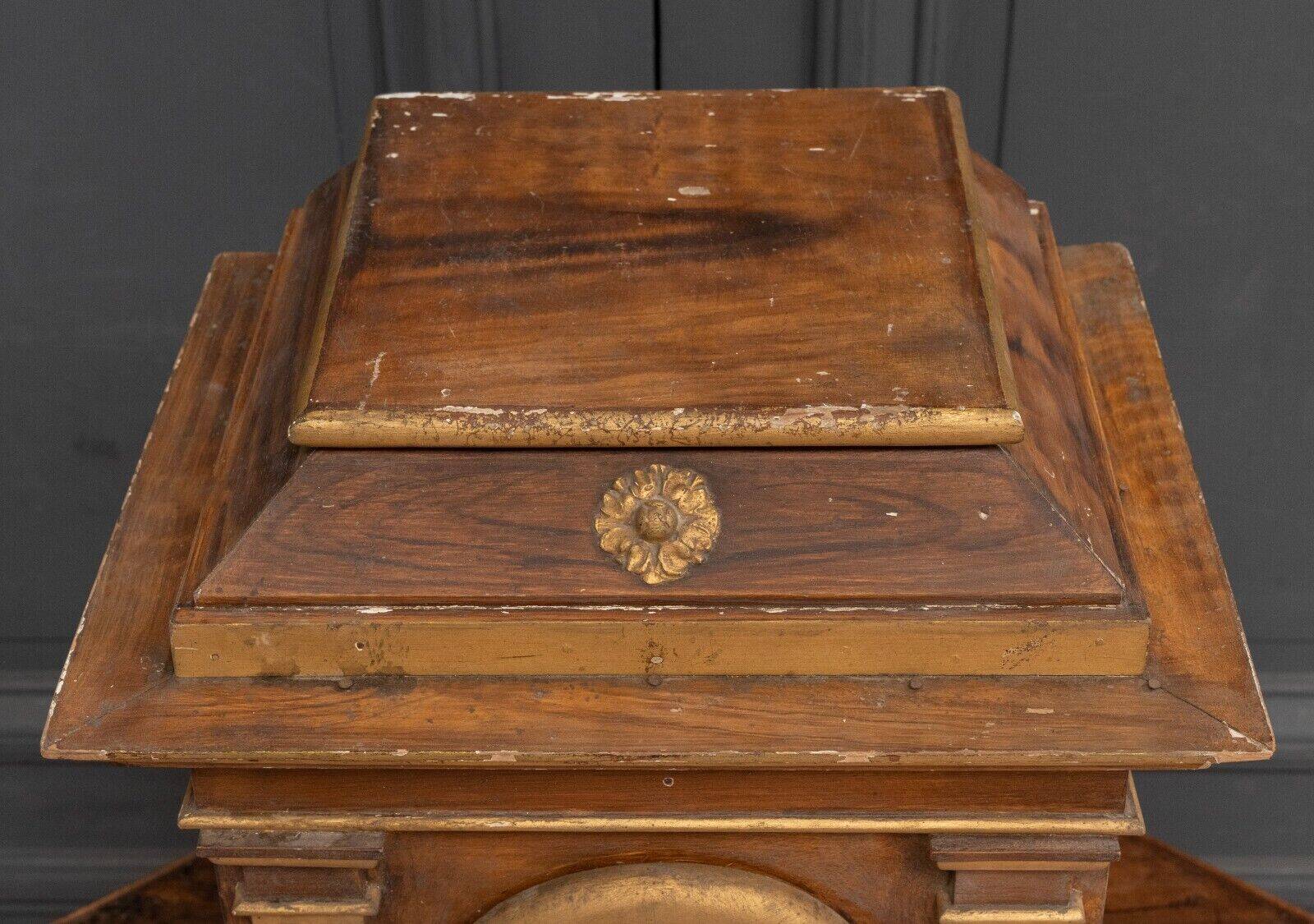 18th century tabernacle decorated with 2 columns and a sun on the facade