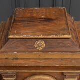 18th century tabernacle decorated with 2 columns and a sun on the facade