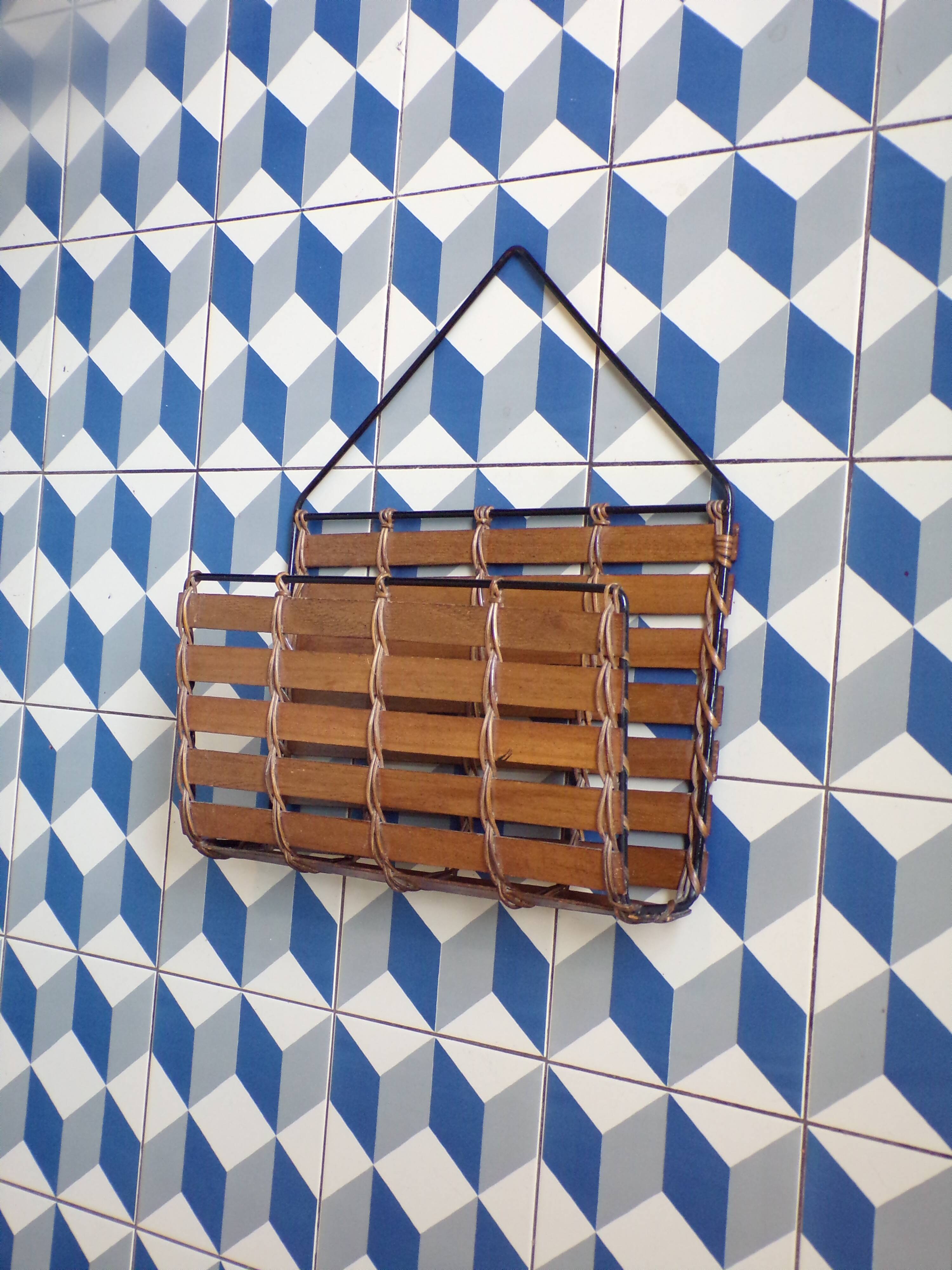 Vintage wall-mounted magazine rack