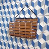 Vintage wall-mounted magazine rack