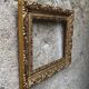 Old gilded frame with leaf