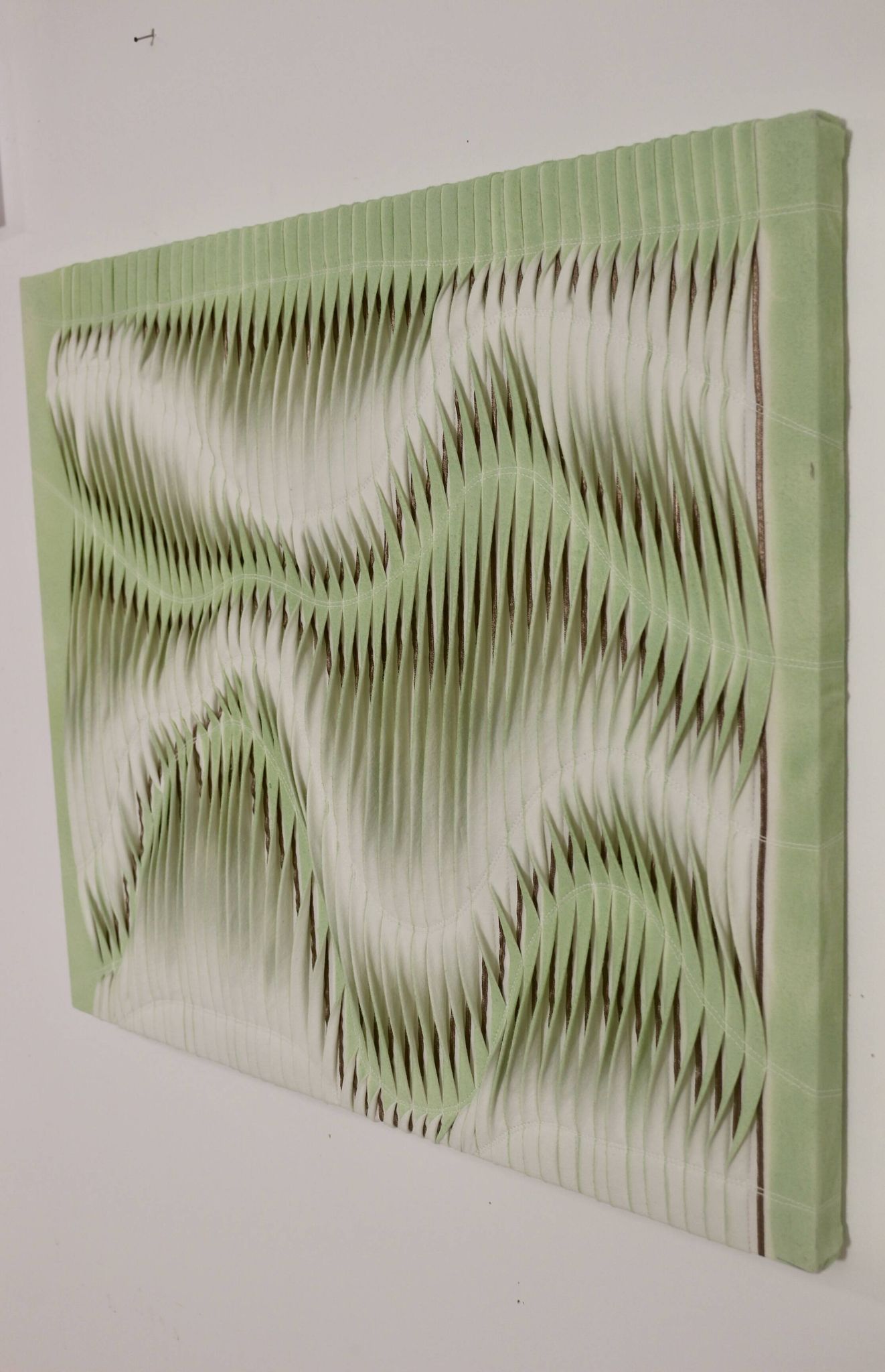 Textured wave effect painting by pleating in light green color. Contemporary. Ref Riviera