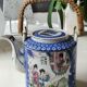 Japanese-inspired porcelain teapot.otifs Geishas kimonos, cherry blossoms