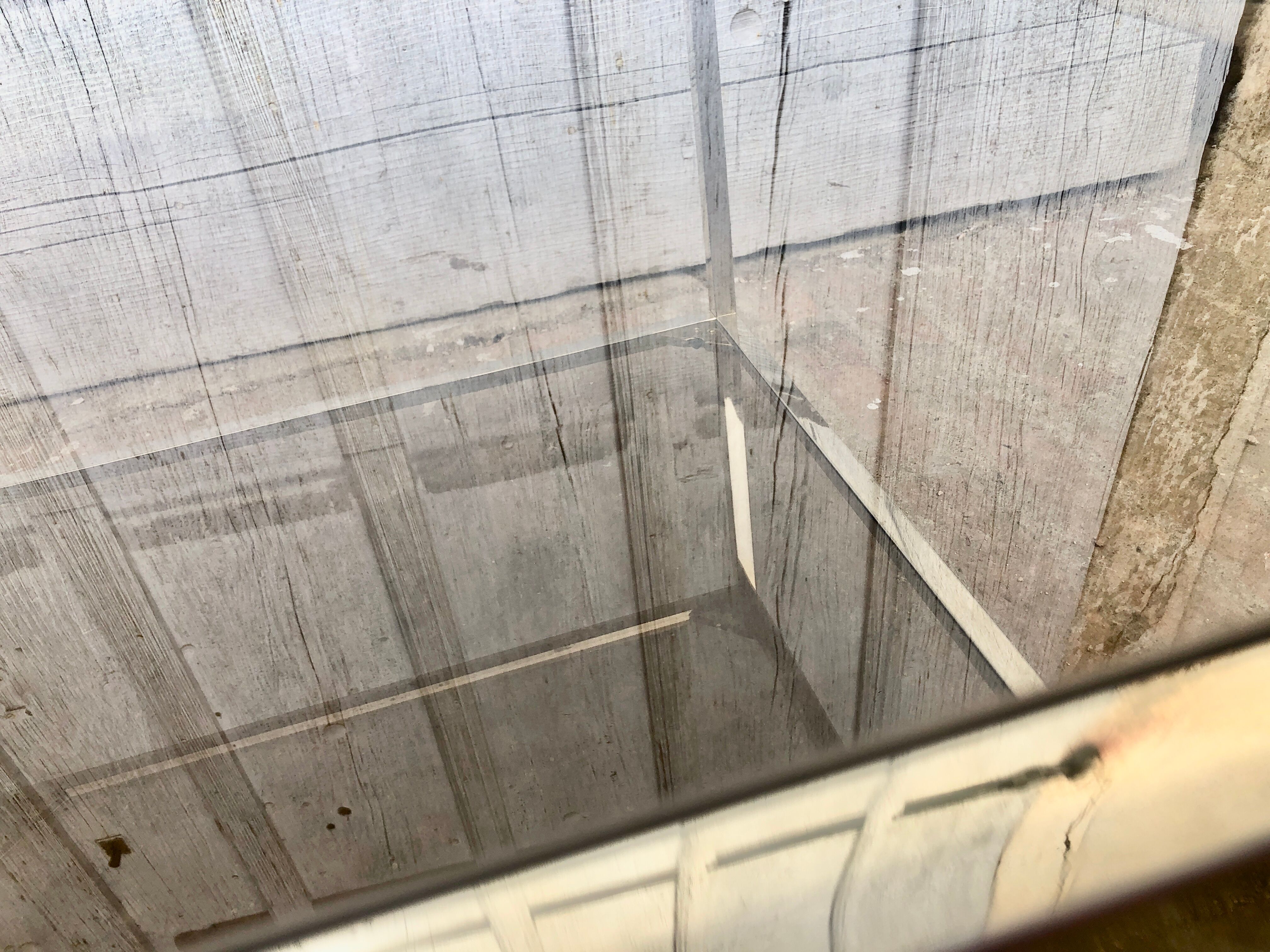 Square brass coffee table and smoked glasses