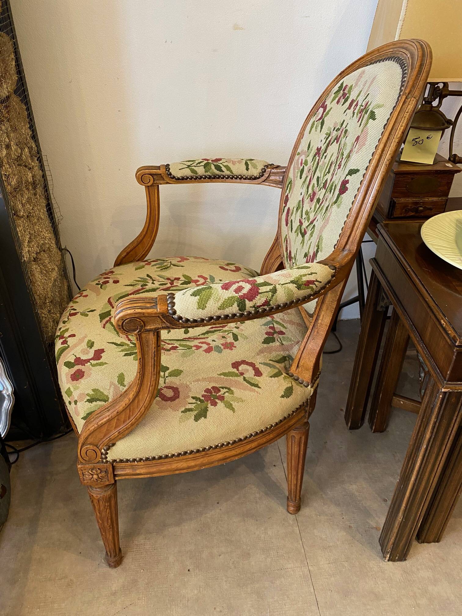 Louis XVI style medallion armchair with floral needlepoint tapestry