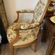 Louis XVI style medallion armchair with floral needlepoint tapestry
