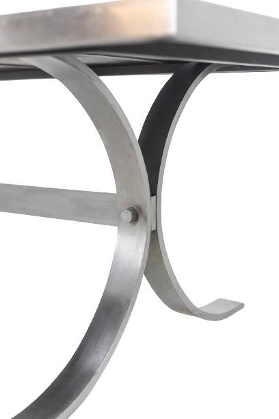 Polished metal and ceramic dining table. 1970s.