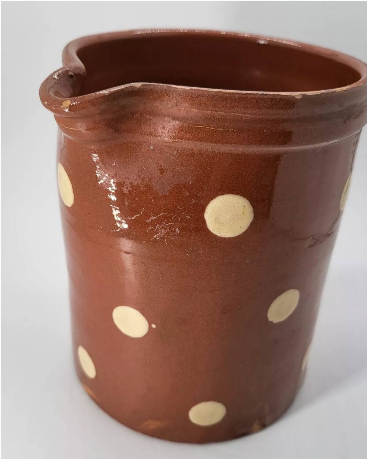 Old pitcher with polka dots savoyard pottery in glazed terracotta alsace