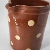 Old pitcher with polka dots savoyard pottery in glazed terracotta alsace